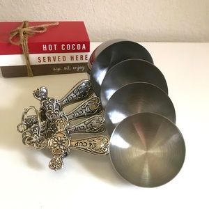 Silver cross measuring cups, set of 4